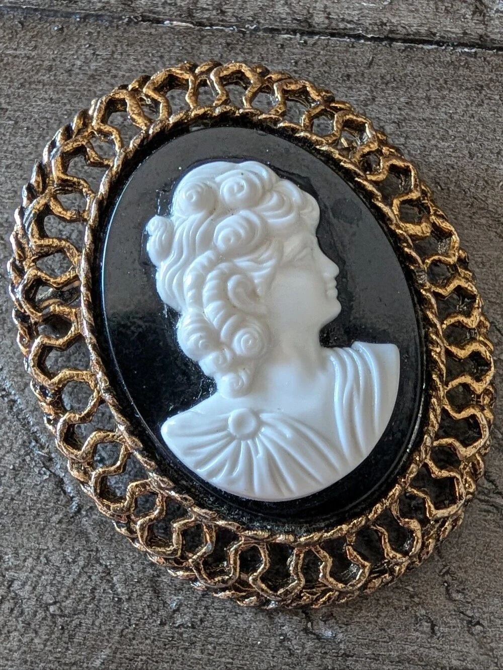 Classic Black and White Cameo Brooch with Gold Frame